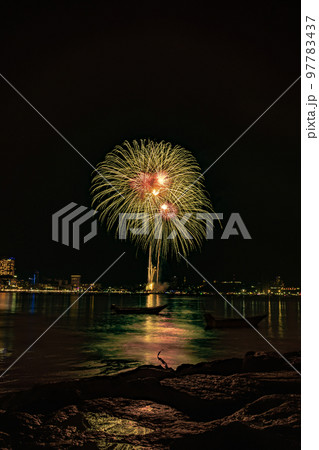 Abstract colored firework background light up the sky with dazzling display Abstract colored firework background light up the sky with dazzling display 97783437