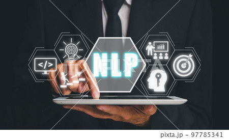NLP natural language processing cognitive computing technology concept, Business person hand using digital tablet with VR screen NLP icon, AI Artificial intelligence. 97785341