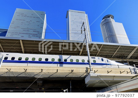 愛知県名古屋市　名古屋駅の駅ビルと東海道新幹線N700系電車 97792037