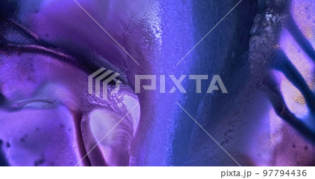 Blue-purple paint flow down, copy space for text. Slow motion. Shiny blue inks mix background. Color mixing, flowing fluid backdrop. Acrylic move pattern texture. Blue liquid river art 97794436