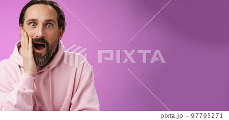 Impressed fascinated speechless mature male attend interesting lecture drop jaw thrilled touch cheek palm widen eyes surpised astonished, standing purple background amzed and amused Impressed fascinated speechless mature male attend interesting lecture drop jaw thrilled touch cheek palm widen eyes surpised astonished, standing purple background amzed and amused 97795271