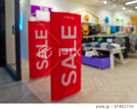 Blurred image of scanner entrance gate for prevent theft in clothing store. Blurred image of scanner entrance gate for prevent theft in clothing store. 97802750
