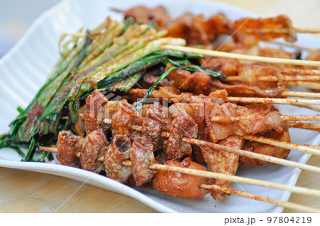 barbecued pork or grilled pork , grilled chitterlings or fried chitterlings barbecued pork or grilled pork , grilled chitterlings or fried chitterlings 97804219