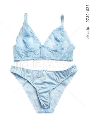 Elegant light blue women's underwear isolated on white, top view 97804825