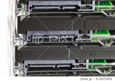 pile or stack of HDD, SSHD Hybrid hard disk drives 3.5" standard profile show on SATA interface, isolated on white background pile or stack of HDD, SSHD Hybrid hard disk drives 3.5" standard profile show on SATA interface, isolated on white background 97805969