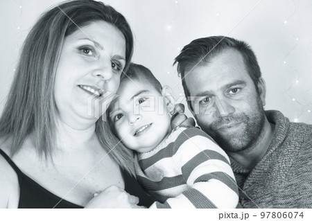 Family scene with pregnant mother, father and little son Family scene with pregnant mother, father and little son 97806074