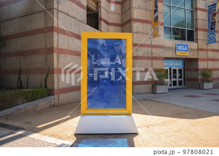 Los Angeles, USA. September 20, 2022. Blue and yellow frame with UCLA text displayed in front of college building at campus for marketing Los Angeles, USA. September 20, 2022. Blue and yellow frame with UCLA text displayed in front of college building at campus for marketing 97808021