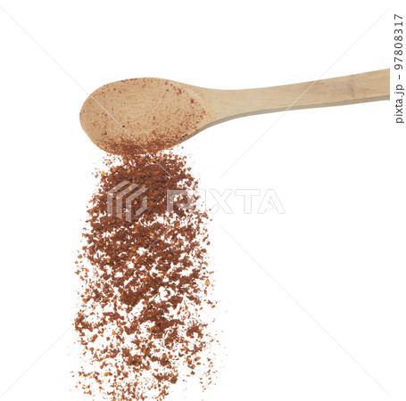 Red Hot Chilli fall, red grain chilli explode abstract cloud fly from wooden spoon. Beautiful complete seed chilly, food object design. Selective focus freeze shot white background isolated 97808317
