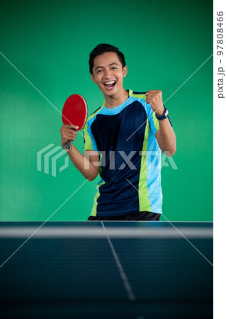 Asian male players excited to win a ping pong match 97808466