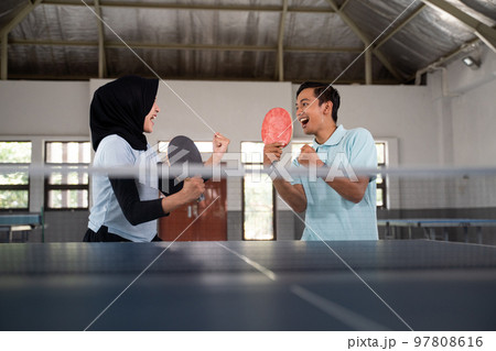 mixed doubles ping pong athlete excited to win mixed doubles ping pong athlete excited to win 97808616
