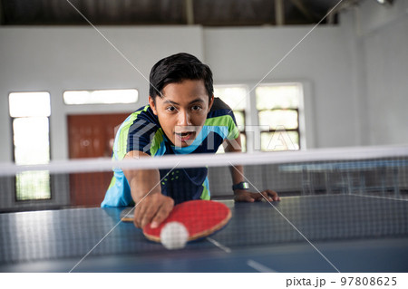 male ping pong player does not get the ball 97808625