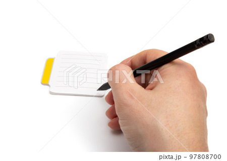 Hand with pencil writing on small lined sticky notes isolated on white background Hand with pencil writing on small lined sticky notes isolated on white background 97808700