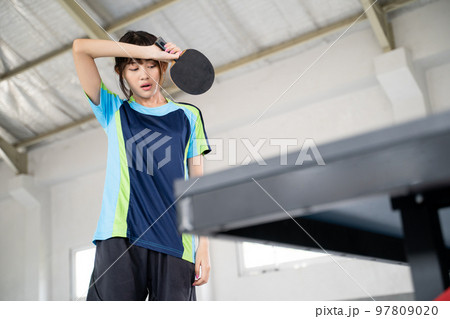 female ping pong athlete tired and down with match results female ping pong athlete tired and down with match results 97809020