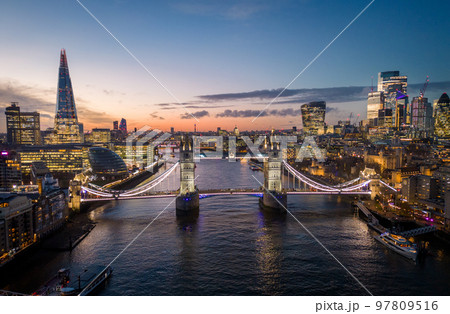 London with River Thames and Tower Bridge - amazing aerial view in the evening London with River Thames and Tower Bridge - amazing aerial view in the evening 97809516