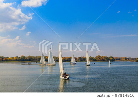 Yachts at sailing regatta on the Dnieper river in Kremenchug, Ukraine Yachts at sailing regatta on the Dnieper river in Kremenchug, Ukraine 97814916