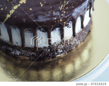 dark chocolate frosted drip cake with best wishes topping written in italian dark chocolate frosted drip cake with best wishes topping written in italian 97816829