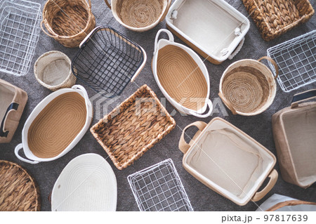 Flat lay of storage boxes; containers and baskets with different sizes and shapes 97817639