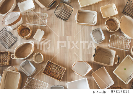 Flat lay of storage boxes; containers and baskets with different sizes and shapes 97817812