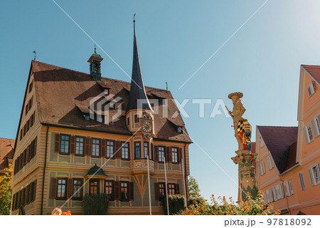 Old national German town house in Bietigheim-Bissingen, Baden-Wuerttemberg, Germany, Europe. Old Town is full of colorful and well preserved buildings. Old national German town house in Bietigheim-Bissingen, Baden-Wuerttemberg, Germany, Europe. Old Town is full of colorful and well preserved buildings. 97818092