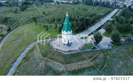 Chapel of Paraskeva Pyatnitsa at the Karaulnaya mountain in Krasnoyarsk. Aerial view. Chapel of Paraskeva Pyatnitsa at the Karaulnaya mountain in Krasnoyarsk. Aerial view. 97825317