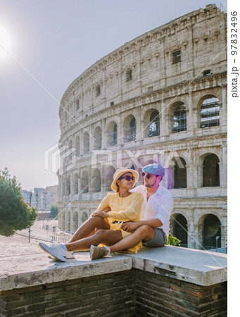 Couple visit the Colosseum in Rome at a city...の写真素材