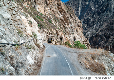 a road in the mountains carved in the rock a road in the mountains carved in the rock 97835042