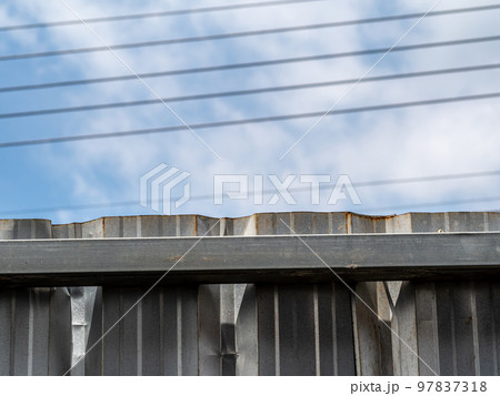 The surface texture of Metal sheet Fence of Construction Site The surface texture of Metal sheet Fence of Construction Site 97837318