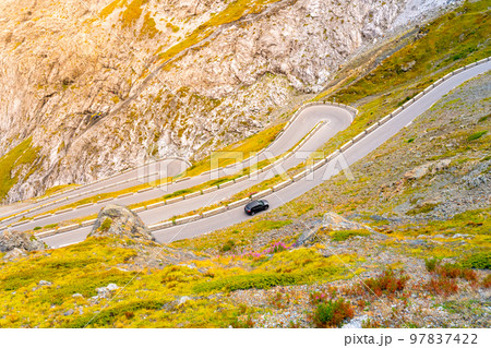 Serpentines of alpine mountain road to Stelvio Pass, Italian: Passo dello Stelvio, South Tyrol, Italian Alps, Italy Serpentines of alpine mountain road to Stelvio Pass, Italian: Passo dello Stelvio, South Tyrol, Italian Alps, Italy 97837422