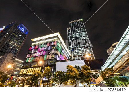 Night view of modern buildings in Xinyi District, Taipei, Taiwan. the District is Taipei's main shopping area, anchored by several department stores and malls. 97838659