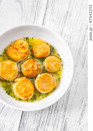 Portion of fried scallops 97842252