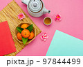 Chinese language mean rich or wealthy and happy.Top view aerial image decoration Chinese new year  lunar new year holiday background concept.Flat lay red orange with blossom on modern  paper. 97844499