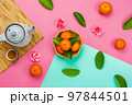 Chinese language mean rich or wealthy and happy.Top view aerial image decoration Chinese new year  lunar new year holiday background concept.Flat lay red orange with blossom on modern  paper. 97844501