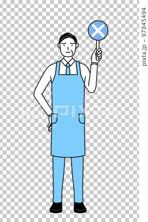 不正解を示すバツの棒を持つエプロンを着たシニア男性 97845494