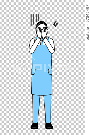 落ち込んで顔を覆うエプロンを着たシニア男性 97845497