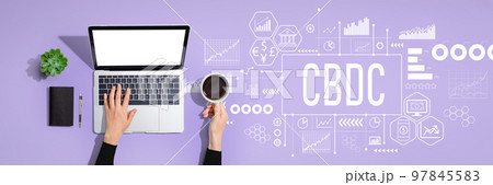 CBDC theme with person using laptop computer 97845583