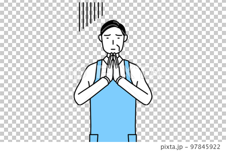 体の前で手を合わせて謝るエプロンを着たシニア男性 97845922