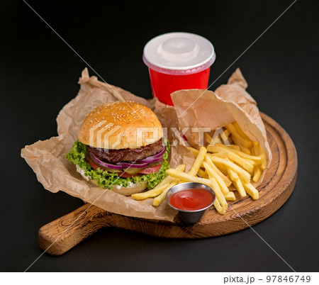 Hamburger, french fries, cola drink. Takeaway food. Fast food. Hamburger, french fries, cola drink. Takeaway food. Fast food. 97846749