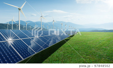 Solar panels and wind generators under blue sky 97848502