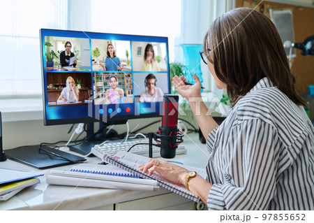 Female teacher working at home, online lesson with group of teenage students Female teacher working at home, online lesson with group of teenage students 97855652