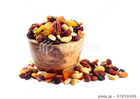 Mix of nuts and dried fruits isolated on a white background. 97859309