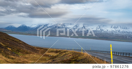Highway road and mountain view during auto trip in Iceland. Spectacular Icelandic landscape with  scenic nature 97861276