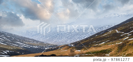 Highway road and mountain view during auto trip in Iceland. Spectacular Icelandic landscape with  scenic nature 97861277