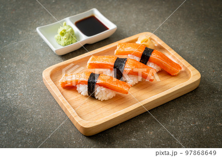 Crab Stick Sushi on wood plate 97868649
