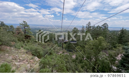 Ski lift ride at the Cheyenne Mountain Zoo during the summer. 97869651