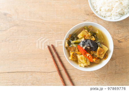 boiled pickled cabbage and bitter gourd soup 97869776