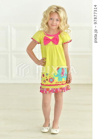 girl posing standing in a white studio 97877314