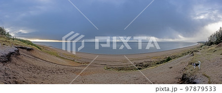 Panorama over the beach in Stillingen bay in Denmark during the day Panorama over the beach in Stillingen bay in Denmark during the day 97879533