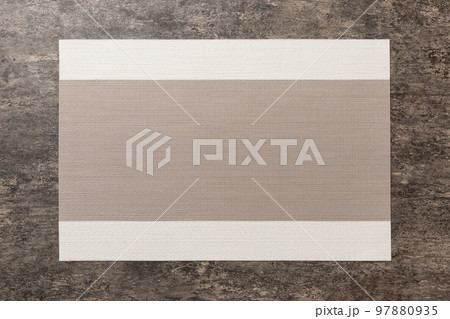 Top view of brown tablecloth for food on cement background. Empty space for your design 97880935