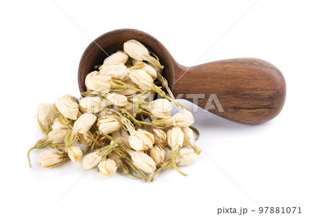 Dry jasmine flowers in wooden spoon, isolated on white background. Jasmine flowers tea. Herbal tea. 97881071