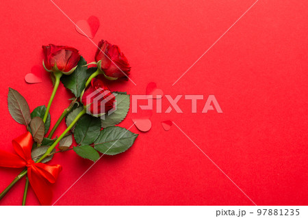 Valentine day composition with rose flower and red heart on table. Top view, flat lay, copy space Holiday concept Valentine day composition with rose flower and red heart on table. Top view, flat lay, copy space Holiday concept 97881235
